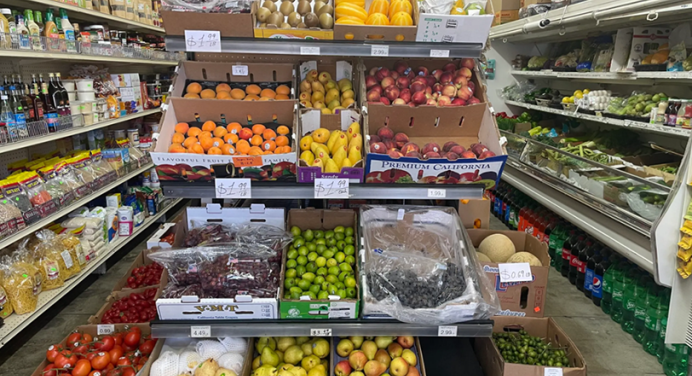 a grocery store with shelves of fresh produce