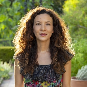 Headshot of Mia Doi Todd