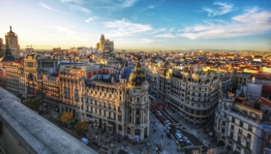 a bird's eye view of a European capital city with old buildings and narrow streets