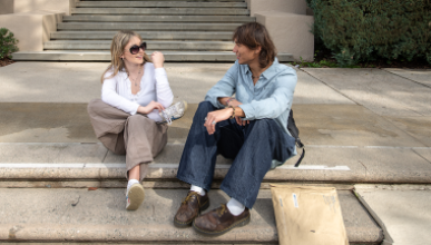 Occidental students sit on the steps outside of Johnson Hall