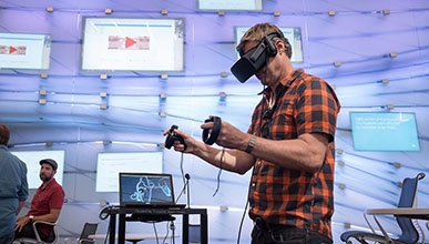 a staff person doing virtual reality