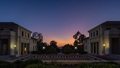 A view of a beautiful purple and orange sunset from the top floor of AGC