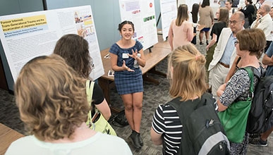 Student presenting at 2019 Summer Research Conference