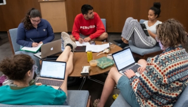 students working together in the library