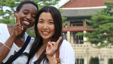Diverse students pose together in Asia