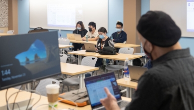 The new computer classroom with professor using the visual t