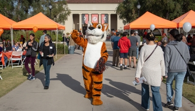 Oswald greets visitors to campus during Explore Occidental Fall Preview Day in November 2023.