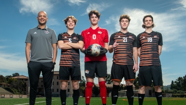 Coach Rod Lafaurie and members of the 2023 men's soccer team