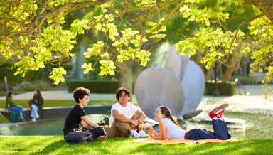 Occidental students relax near Lucille Gilman Fountain on an idyllic fall afternoon.