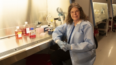 Professor of Biology Roberta Pollock, photographed in her lab in April 2024.