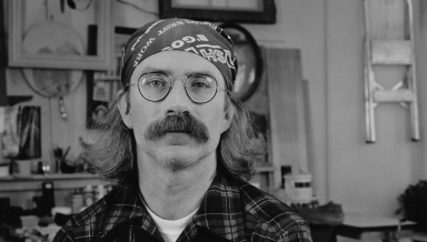 Jim Conlin '74 at home in his garage in Rochester, N.Y., in an undated photo.