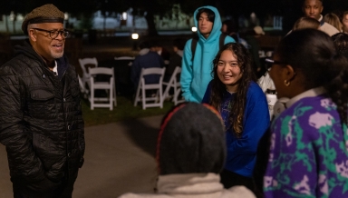 President Elam talks to students at Moonlight Breakfast on the Quad in December 2022.