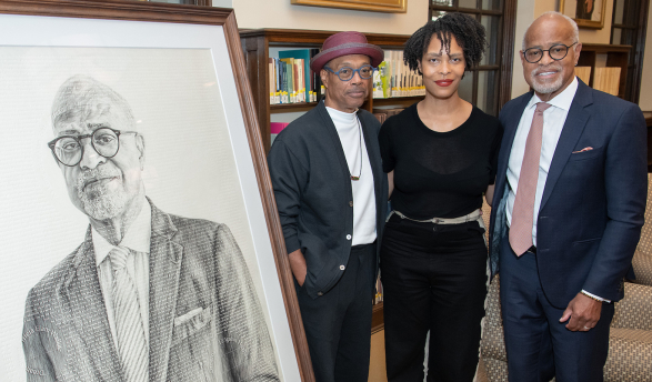 Bob Johnson '77, Kenturah Davis '02, and President Harry Elam Jr.
