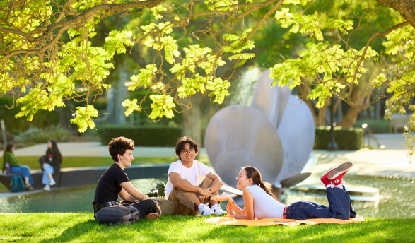 Occidental students relax near Lucille Gilman Fountain on an idyllic fall afternoon.