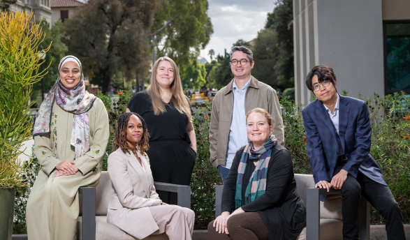 L-R: Associate professors Alaa Abdelfattah (economics), Tiffany Wheatland-Disu (Black studies), Madeline Wander ’08 (urban and environmental policy), Joel Walsh (computer science), Margaret Gaida (history), and Kai Yui Samuel Chan (politics).