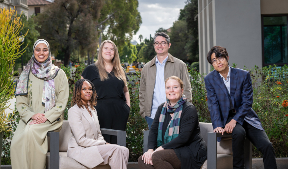 L-R: Associate professors Alaa Abdelfattah (economics), Tiffany Wheatland-Disu (Black studies), Madeline Wander ’08 (urban and environmental policy), Joel Walsh (computer science), Margaret Gaida (history), and Kai Yui Samuel Chan (politics).
