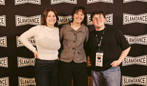 From left, Lizzie Friedrich ’25, Lily Calvert ’25, and Hayden Jennings ’25 share a red-carpet moment during the 2026 Slamdance Film Festival. 