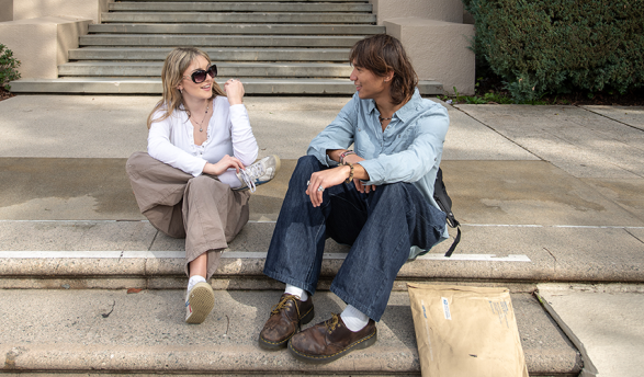 Occidental students sit on the steps outside of Johnson Hall