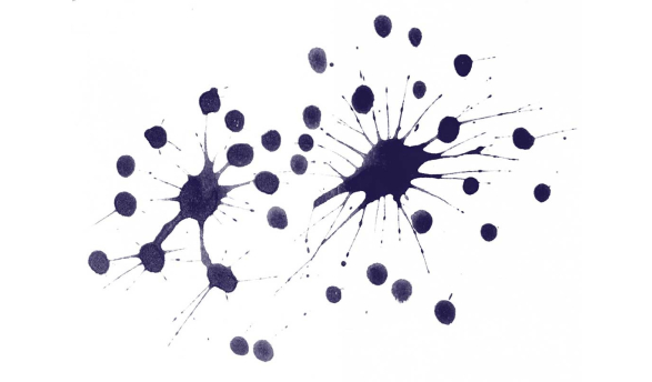 two main blotches of ink, with smaller droplets and thin streaks radiating outwards