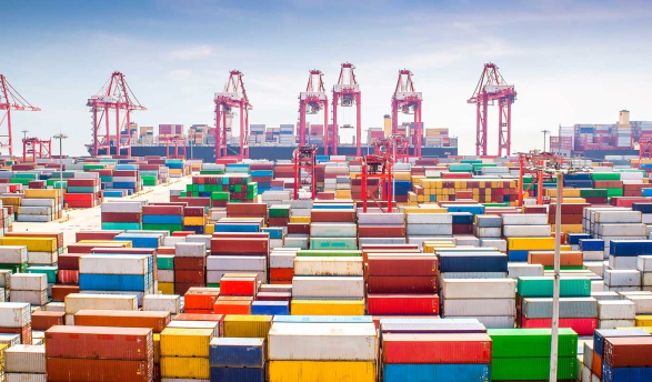  A busy maritime container port with multicolored cargo containers