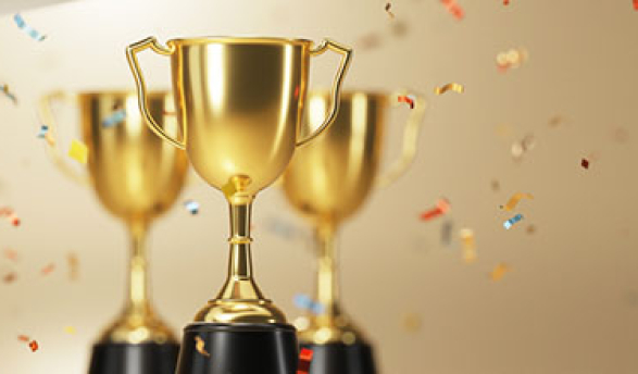 A set of three gold trophies