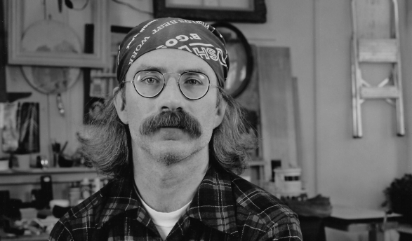 Jim Conlin '74 at home in his garage in Rochester, N.Y., in an undated photo.