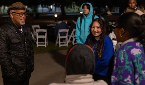 President Elam talks to students at Moonlight Breakfast on the Quad in December 2022.