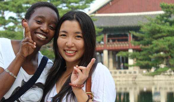 Diverse students pose together in Asia