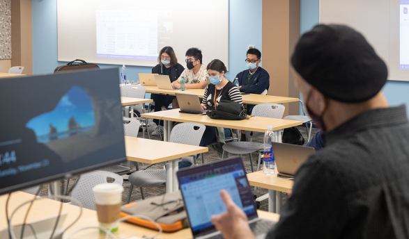 The new computer classroom with professor using the visual t