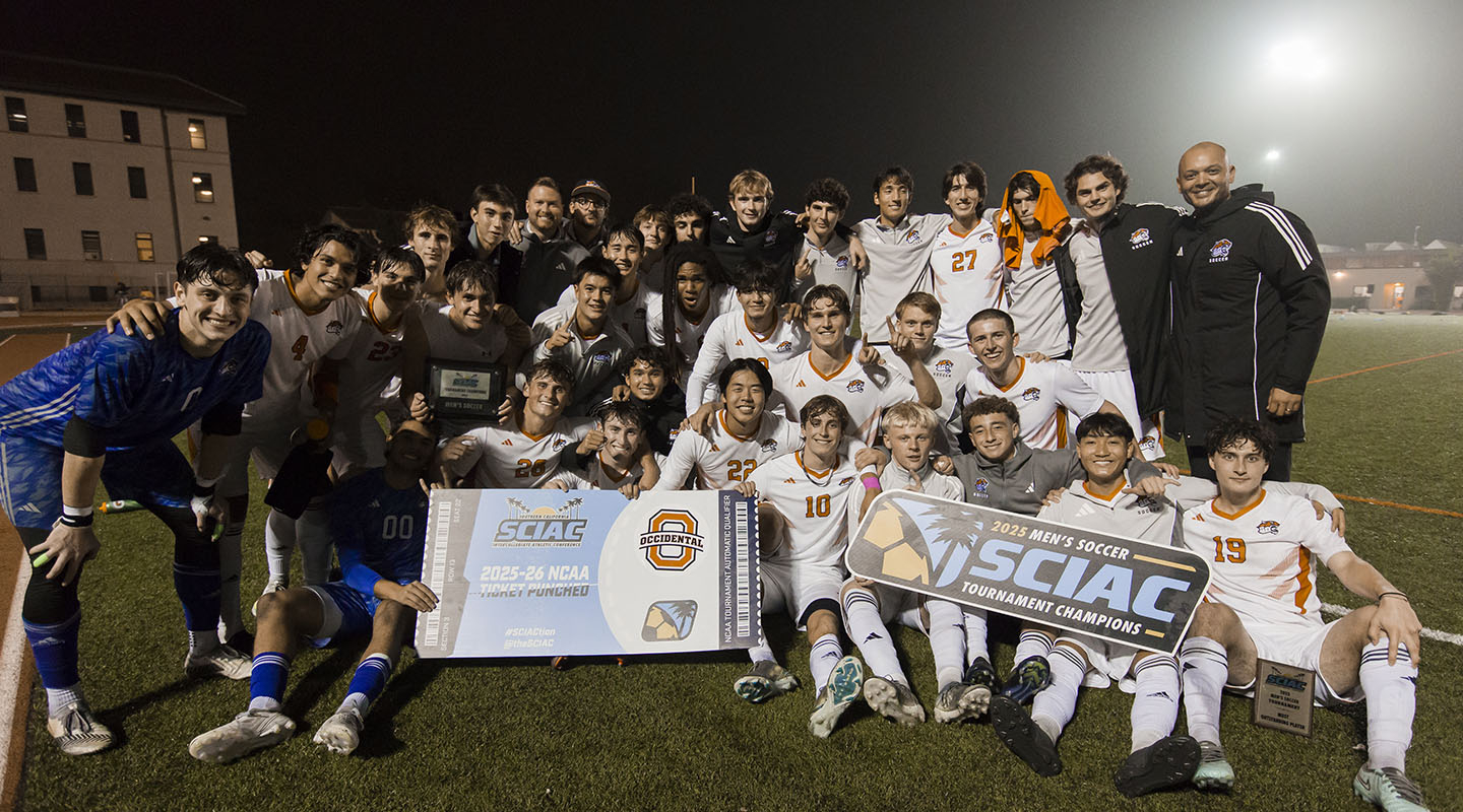 Oxy men's soccer team celebrates a SCIAC championship victory on the field