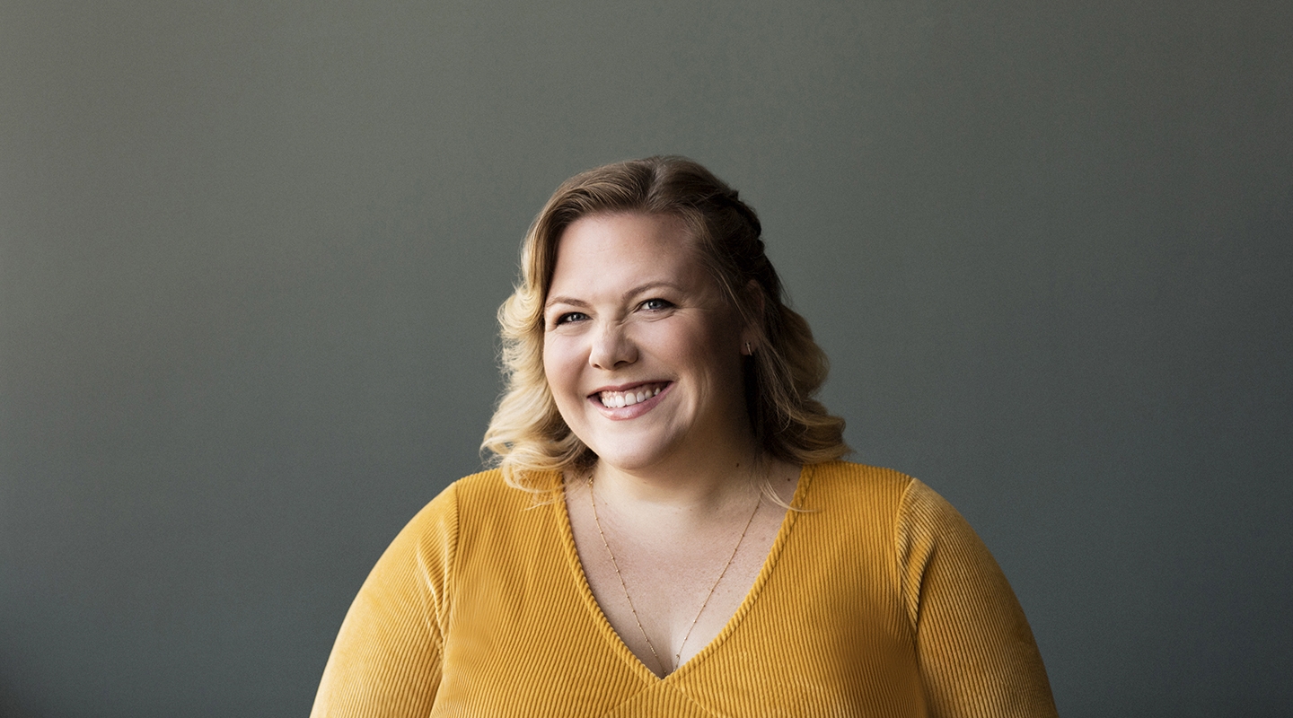 Lindy West headshot in yellow sweater