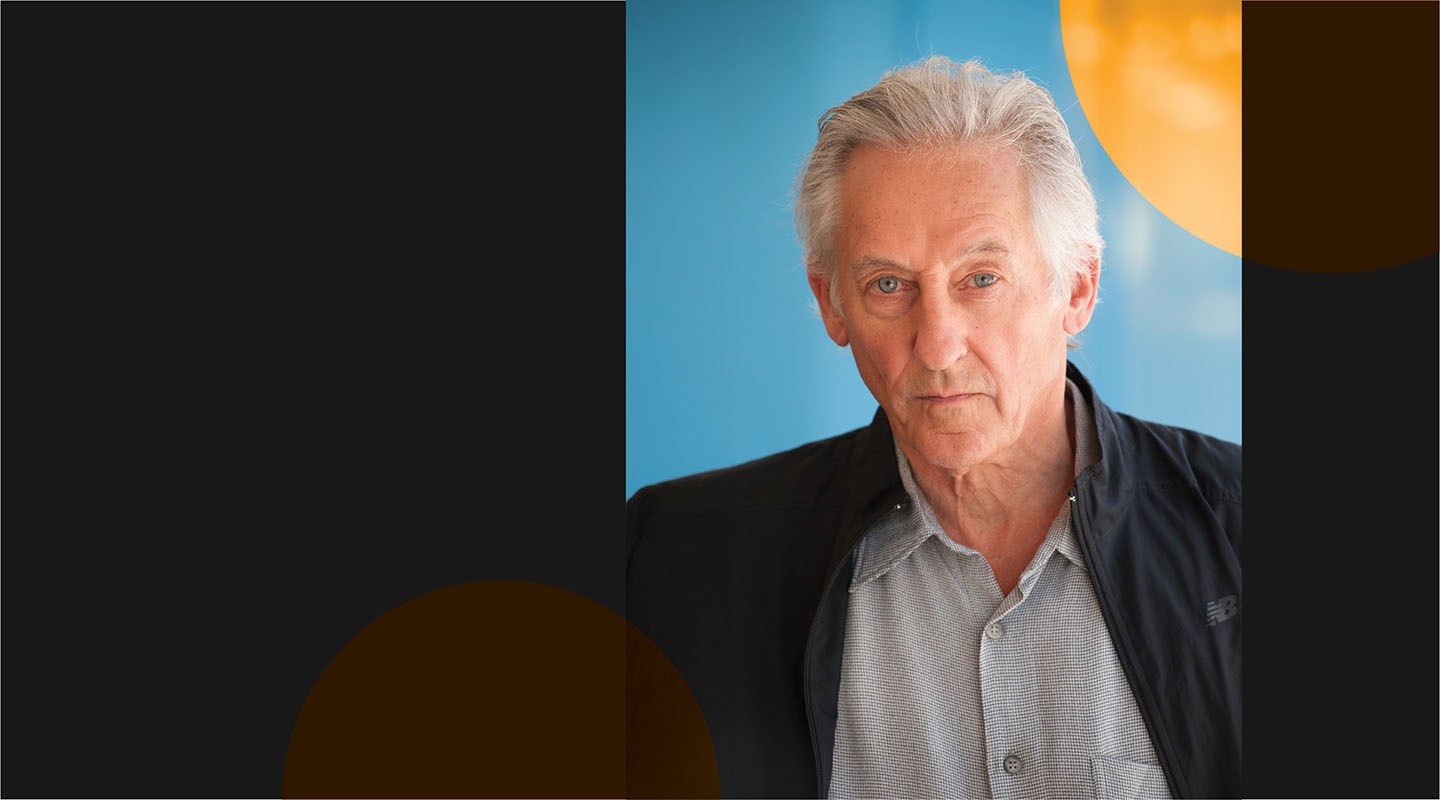 Occidental College Special Guest Artist Ed Ruscha against a light blue and black background