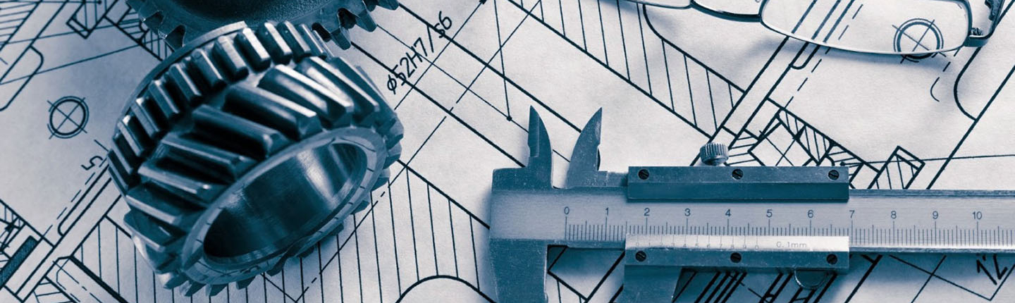Engineering and draftsman's tools on top of engineering planning papers