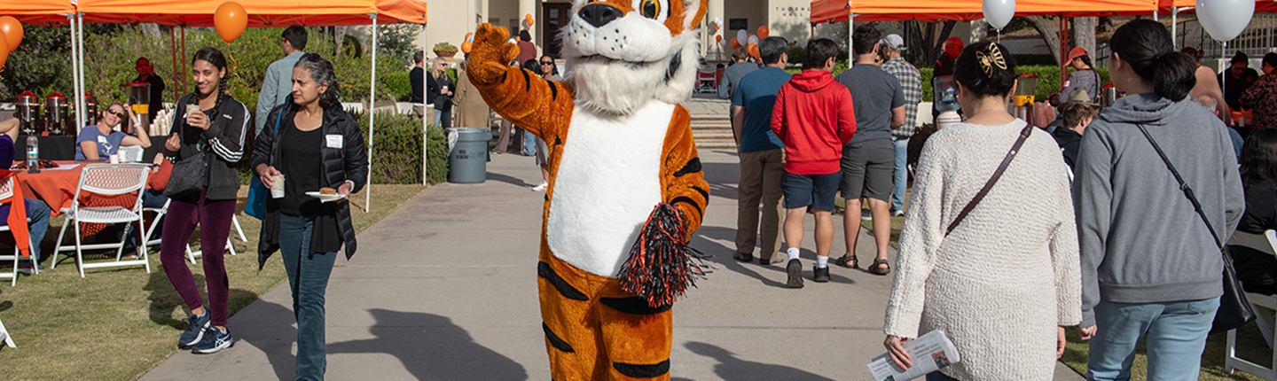 Oswald greets visitors to campus during Explore Occidental Fall Preview Day in November 2023.