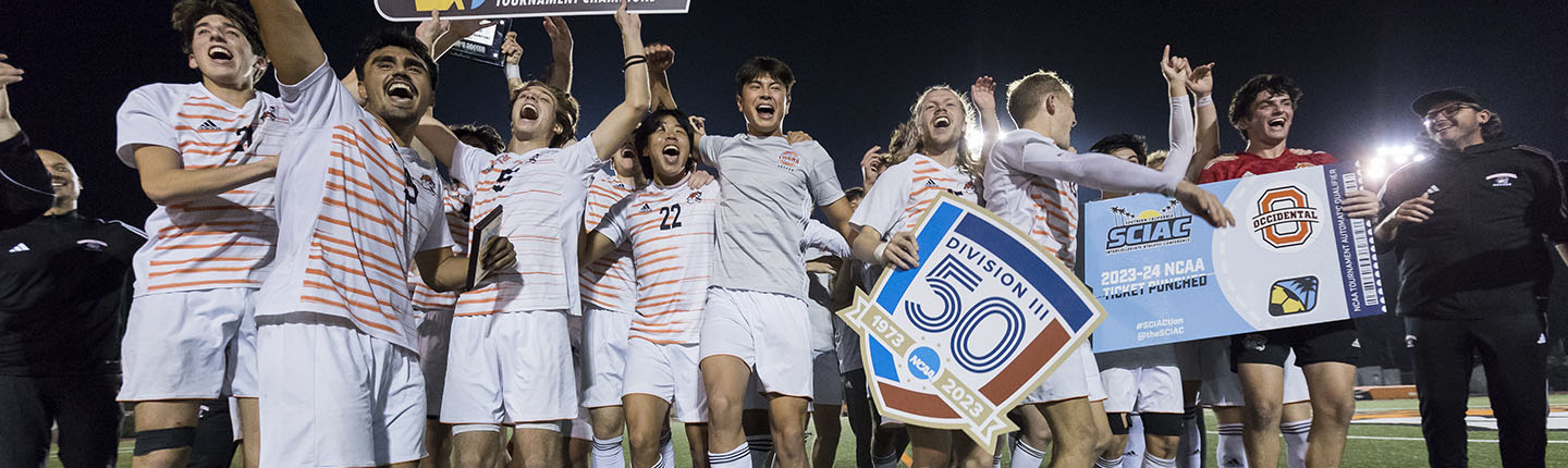 Oxy's men's soccer team celebrating on the field