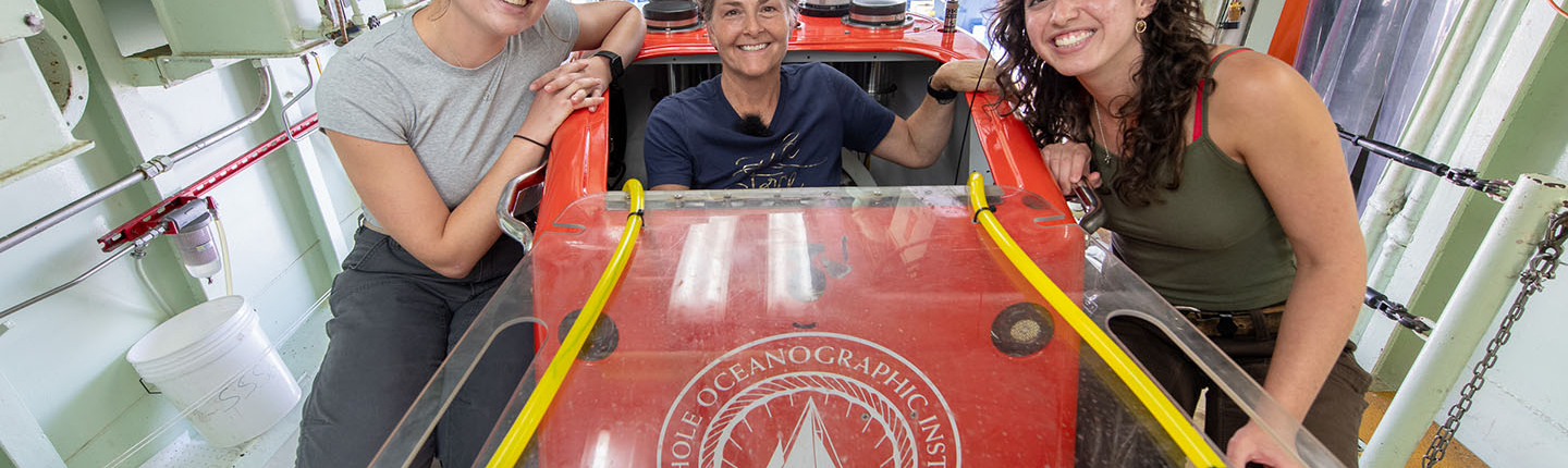 Prof. Shana Goffredi and two Oxy students pose with deep sea submersible ALVIN.
