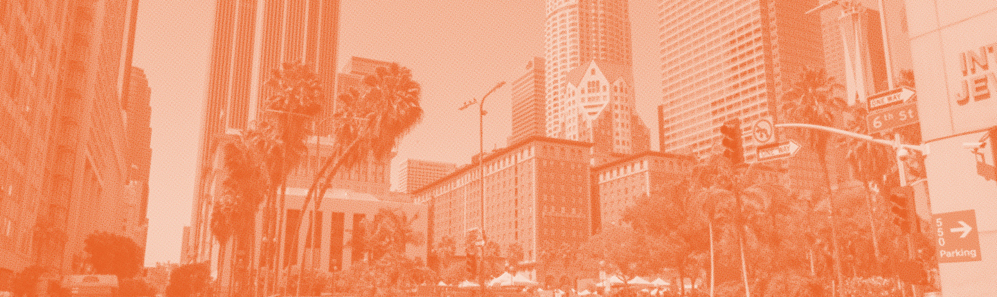Occidental students walk through downtown Los Angeles on a class trip.