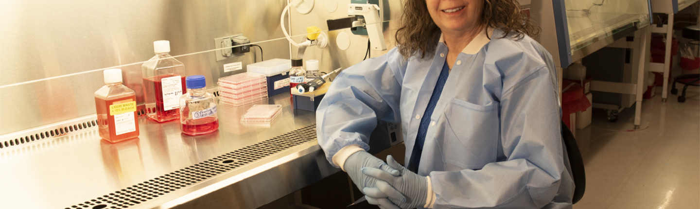 Professor of Biology Roberta Pollock, photographed in her lab in April 2024.