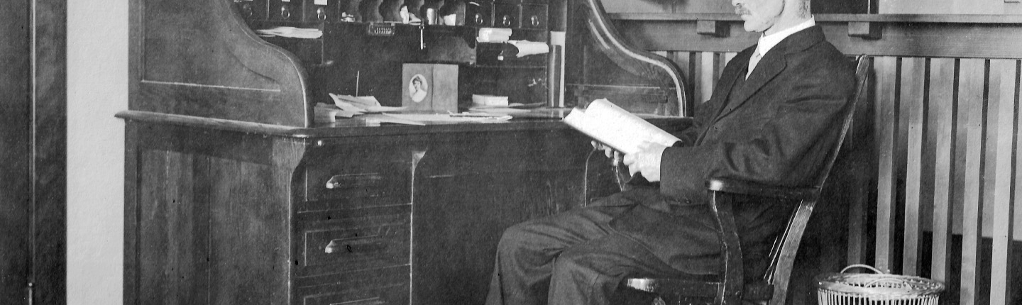 Professor William D. Ward at his desk in the Hall of Letters on Occidental’s Highland Park campus.