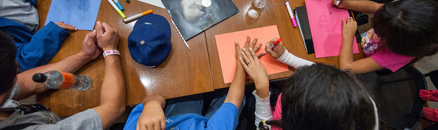 The California Immigration Semester (CIS) and Center for Community Based Learning (CCBL) hosts a group of local elementary school students as part of a "Day at College" event. 