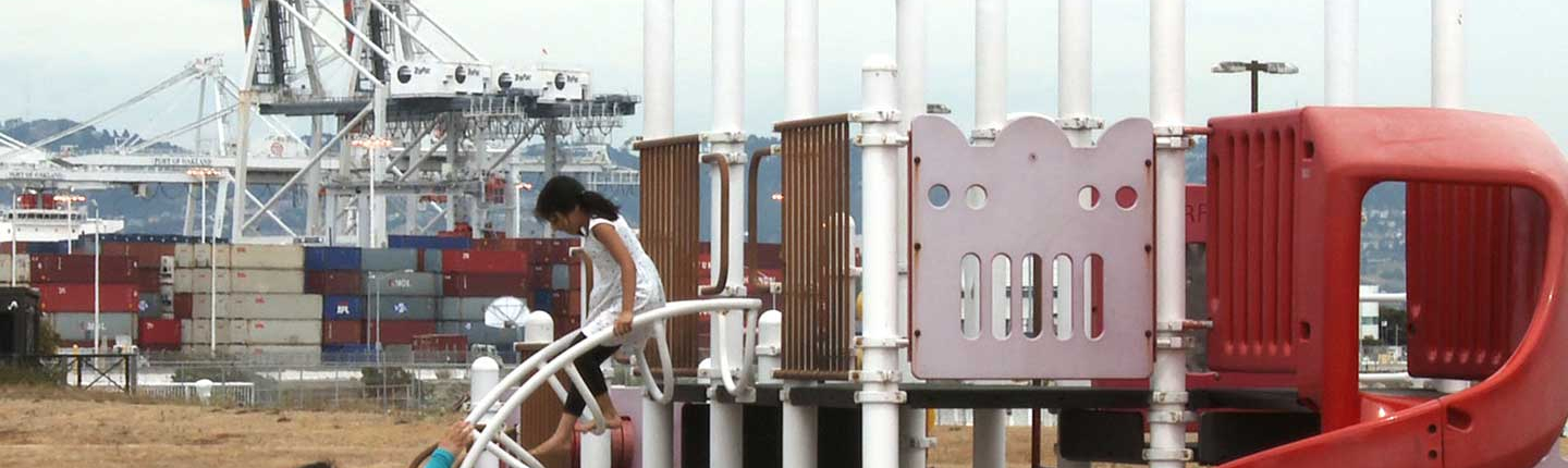 A child and adult at a playground