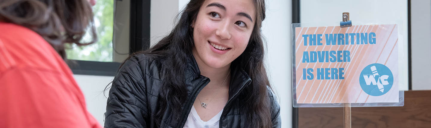 A student writing advisor at the writing center
