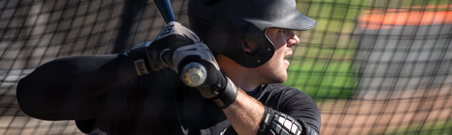 An Oxy baseball player takes batting practice on January 27, 2022.