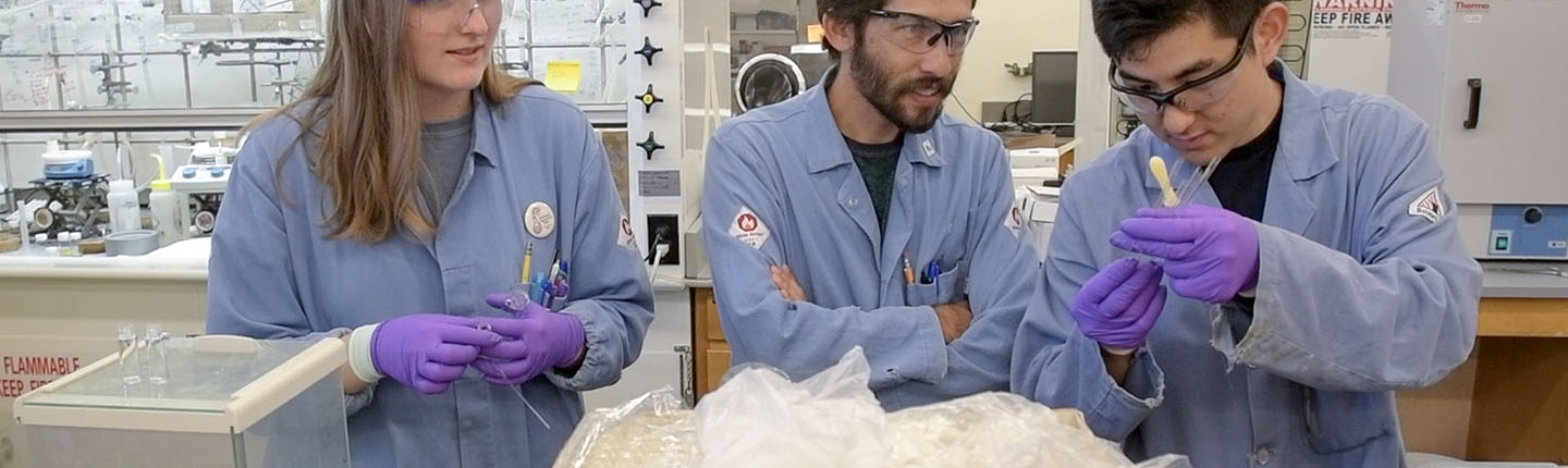 Prof. Jeffrey Cannon and students in the chemistry lab