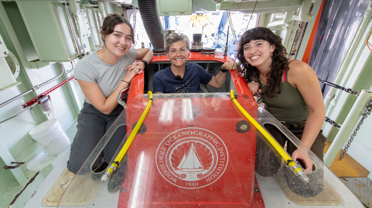 Prof. Shana Goffredi and two Oxy students pose with deep sea submersible ALVIN.