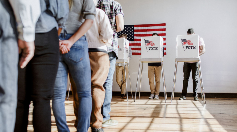 Citizens participating in a United States election by casting their votes at a polling place