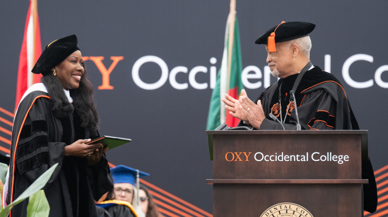 Author Isabel Wilkerson and President Elam