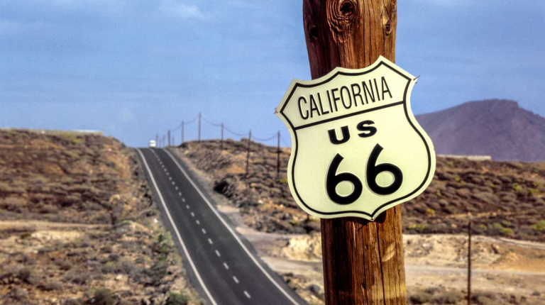 A view of classic US Hightway 66 cutting through the desert, highlighting the interdisciplinary focus of American Studies at Occidental College (Oxy).