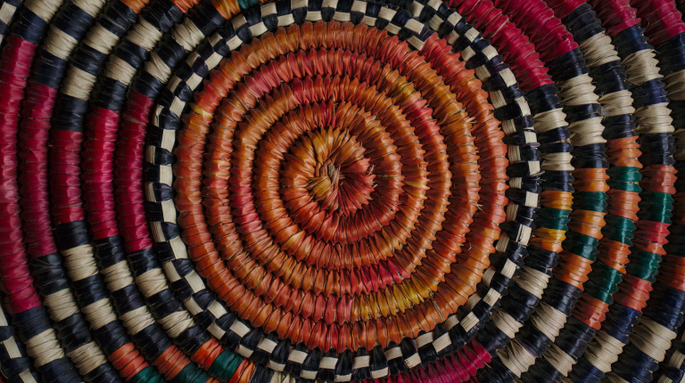 a colorful woven basket