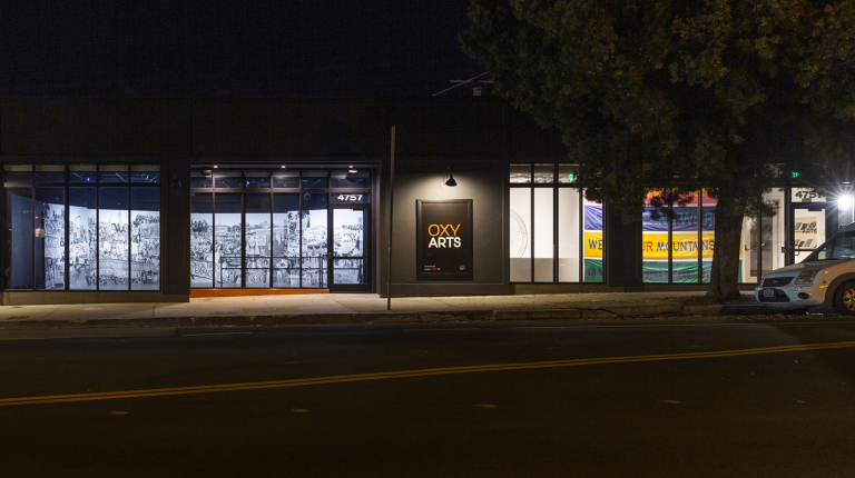 The Oxy Arts building from York Blvd at nighttime